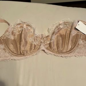 Wacoal beige to pink colored bra with tags. Lace throughout front of entire bra.